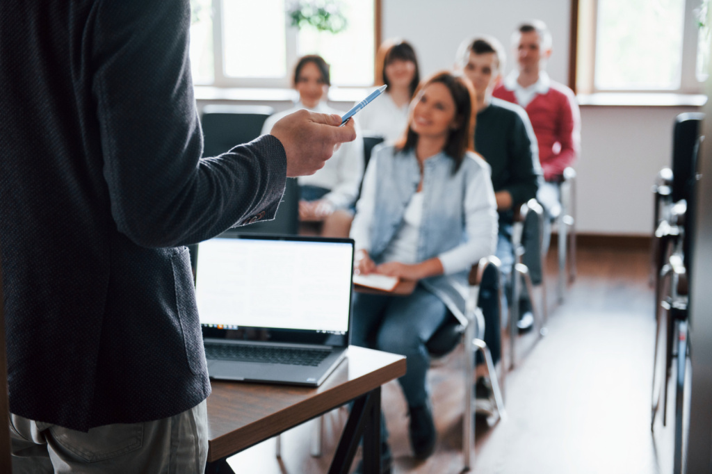 education.jpg everyone-is-smiling-and-listens-group-of-people-at-business-conference-in-modern-classroom-at-daytime.jpg